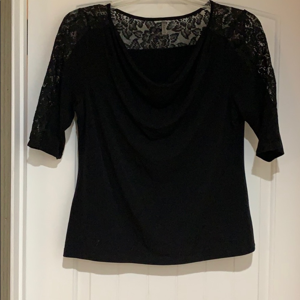 Women’s black scoop neck blouse with lace trim
